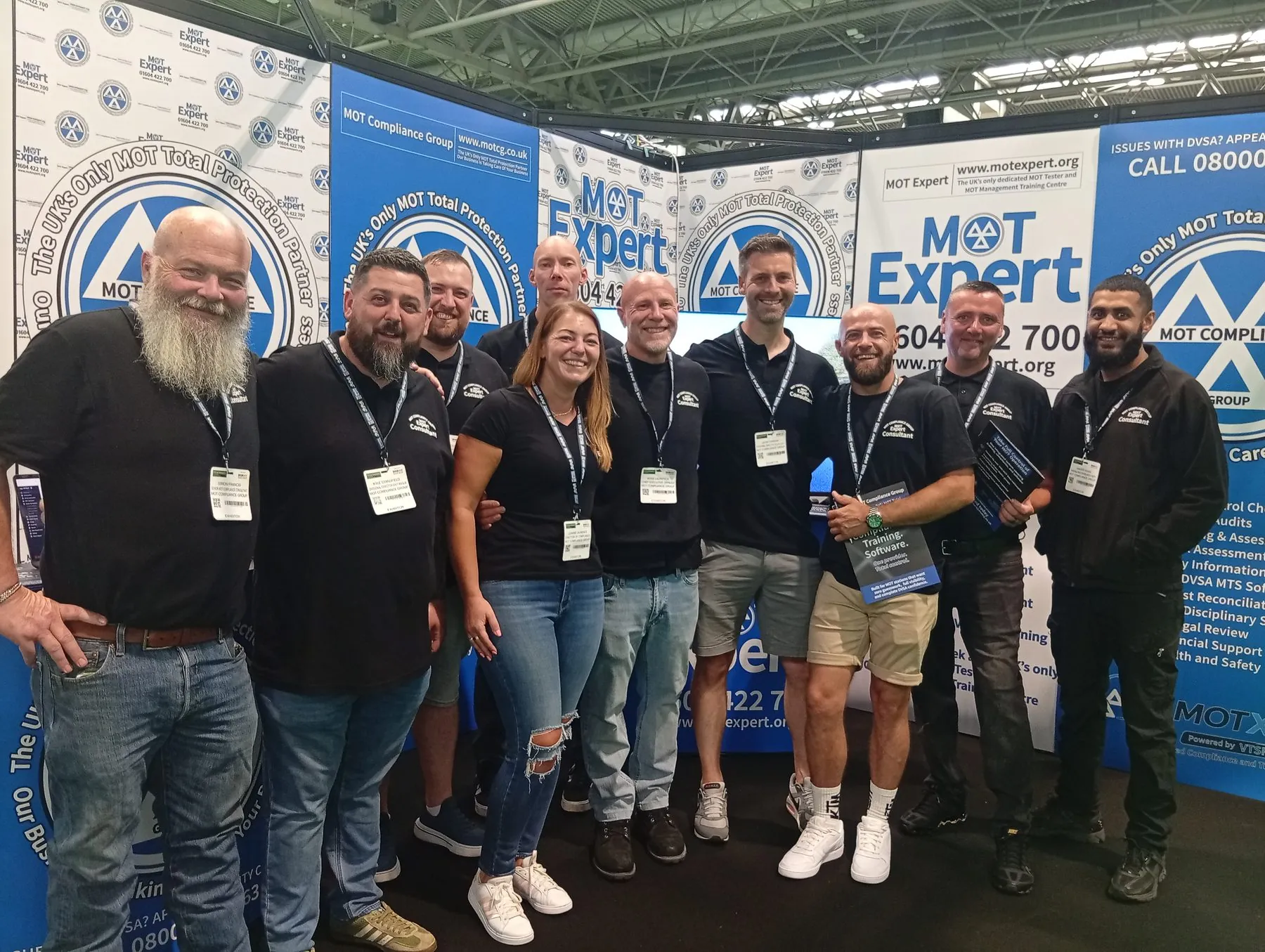 The MOT Compliance Group consultants at the 2026 expo stand